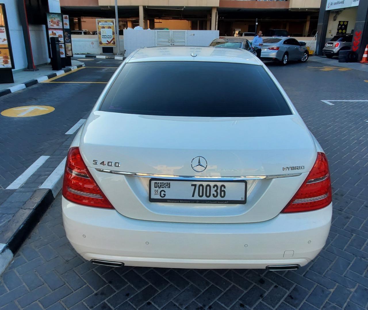 White Mercedes Benz S 400 h 2011